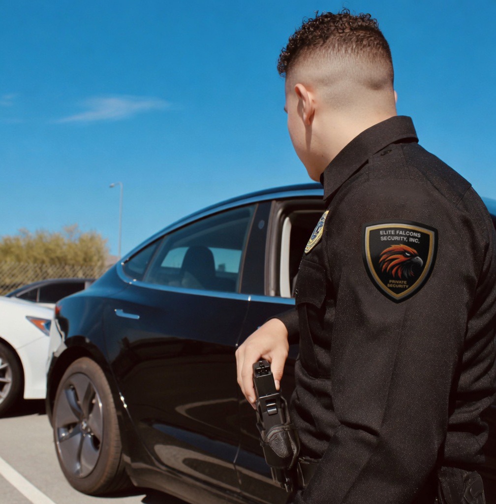 Security guard in black uniform with radio